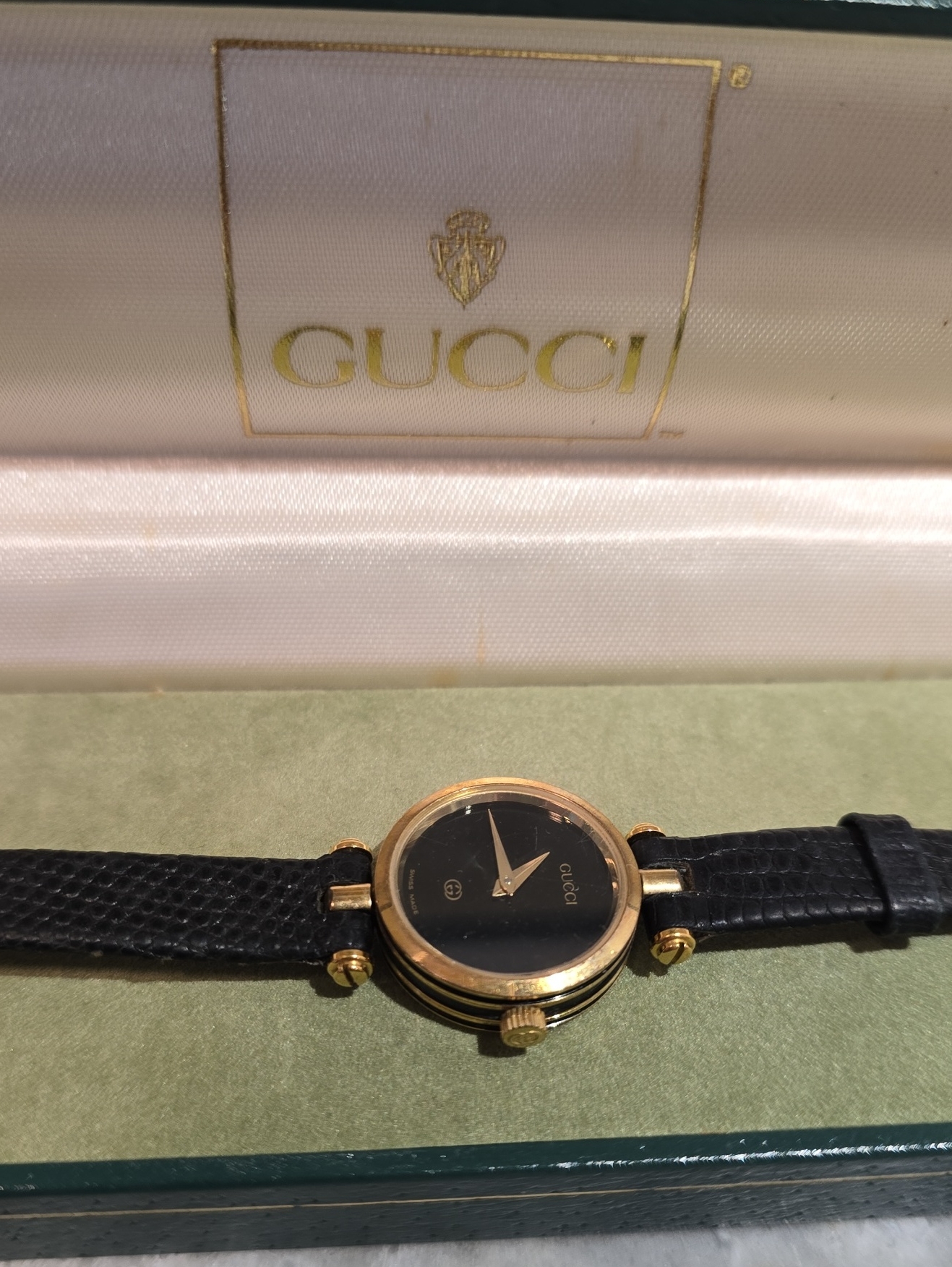 Gucci Black Dial Gold-Tone Round Women's Watch With Black Leather Strap